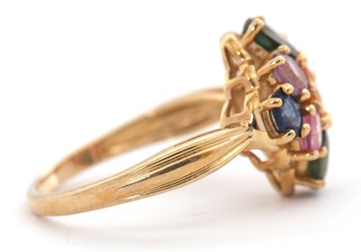 Lot 21 - A 9ct multi gemset ring, set with oval...