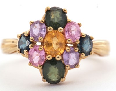 Lot 21 - A 9ct multi gemset ring, set with oval...