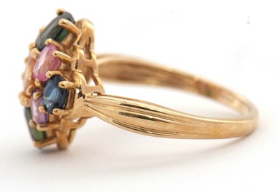 Lot 21 - A 9ct multi gemset ring, set with oval...