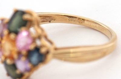 Lot 21 - A 9ct multi gemset ring, set with oval...