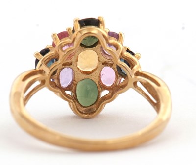 Lot 21 - A 9ct multi gemset ring, set with oval...