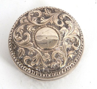 Lot 115 - A continental white metal two part circular...