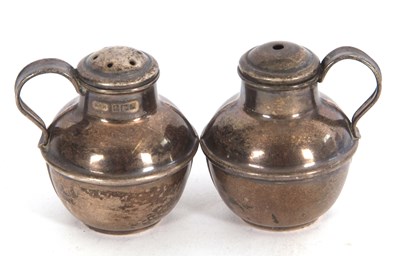 Lot 116 - A pair of Elizabeth II silver salt and pepper...