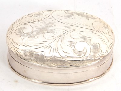 Lot 119 - An Elizabeth II silver oval shaped box, the...