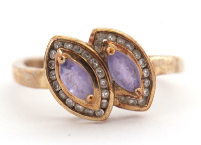 Lot 42 - A 9ct tanzanite and diamond ring, the twin...