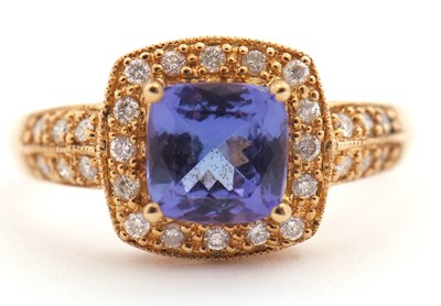 Lot 106 - An 18ct tanzanite ring, the central modified...