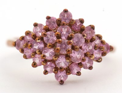 Lot 40 - A 9ct pink sapphire cluster ring, set...