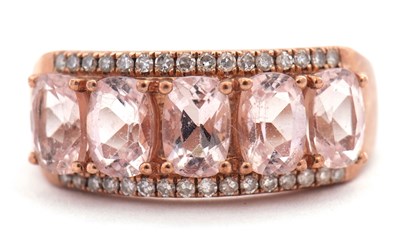 Lot 130 - A 9ct morganite and diamond ring, with five...