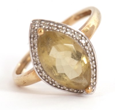 Lot 33 - A 9ct citrine and diamond ring, the marquise...