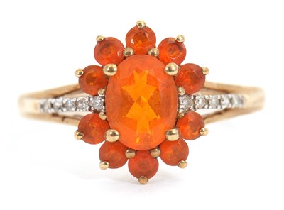 Lot 35 - A 9ct fire opal and diamond ring, the fire...