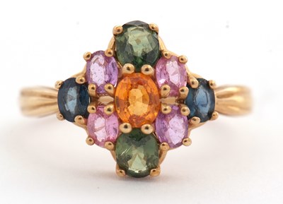 Lot 135 - A 9ct multi gemset ring, set with oval...