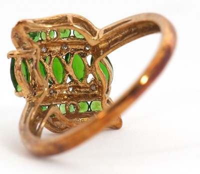 Lot 19 - A 9ct diopside and diamond ring, set with...