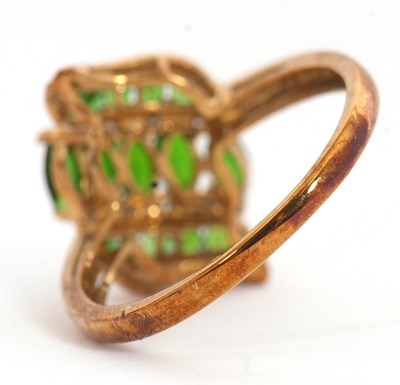 Lot 19 - A 9ct diopside and diamond ring, set with...