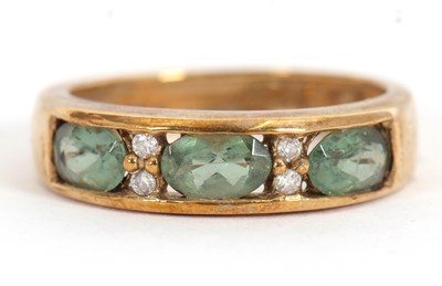 Lot 32 - A 9ct apatite and diamond ring, with three...
