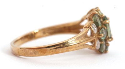 Lot 24 - A 9ct apatite and diamond cluster ring, with...