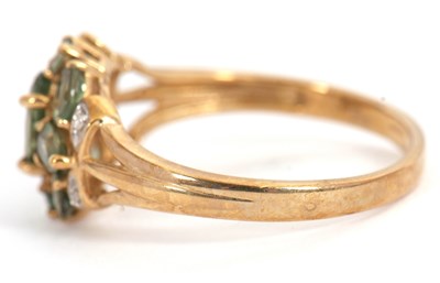Lot 24 - A 9ct apatite and diamond cluster ring, with...