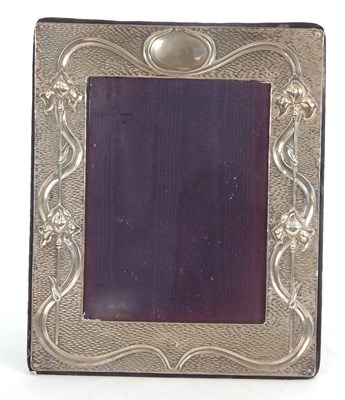 Lot 157 - An Art Nouveau silver mounted photograph frame...