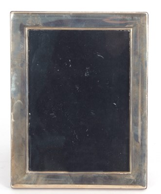 Lot 158 - An Elizabeth II silver mounted photograph...