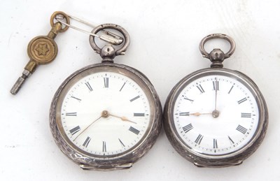 Lot 192 - Two white metal fob watches, both watches are...