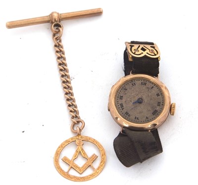 Lot 203 - A 9ct gold watch with a 9ct gold T bar...