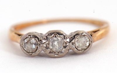 Lot 47 - A three stone diamond ring, set with three...