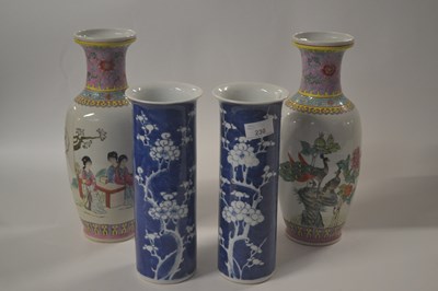Lot 230 - A pair of Chinese porcelain cylindrical vases,...