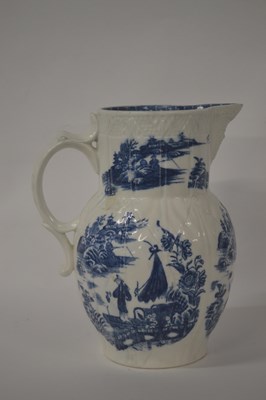 Lot 254 - A Caughley porcelain mask jug with printed...