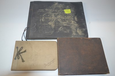 Lot 344 - A group of three photograph albums, the larger...