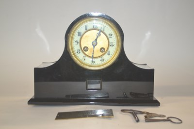 Lot 359 - A mantel clock in glass perspex case with keys