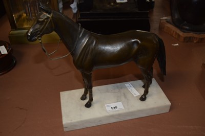 Lot 528 - A 20th Century bronze model of a racehorse set...