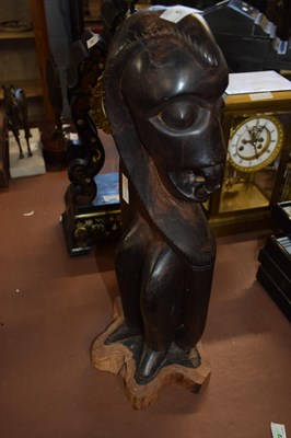 Lot 535 - A West African carved hardwood figure of a...