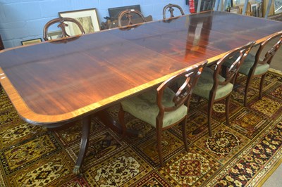 Lot 556 - A Georgian Revival mahogany and satin wood...