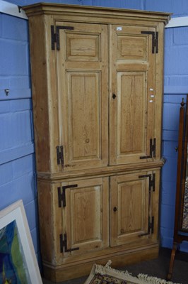 Lot 357 - A Georgian pine floor standing corner cabinet...