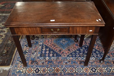 Lot 572 - A George III mahogany folding tea table with a...