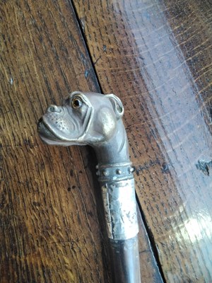 Lot 578 - A novelty walking cane, the cast metal finial...