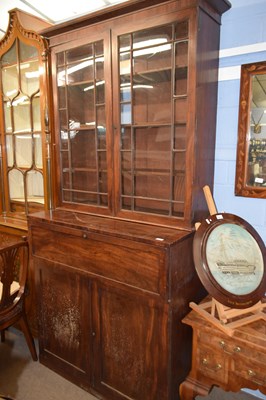 Lot 601 - A Georgian mahogany secretaire bookcase...