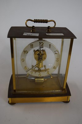 Lot 607 - A 20th Century Kundo brass cased mantel clock
