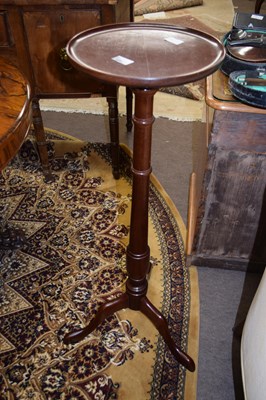 Lot 442 - A 20th Century mahogany torchere plant stand...