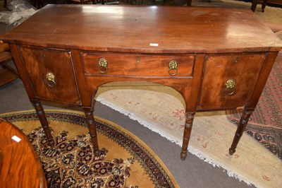 Lot 642 - A late Georgian mahogany bow front sideboard...