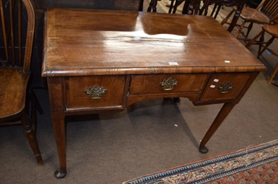 Lot 656 - A Georgian walnut three drawer side table...