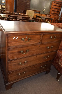 Lot 666 - A George III mahogany chest of two short over...