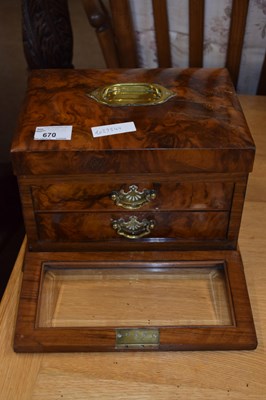 Lot 670 - A Victorian walnut sewing box with hinged lid...