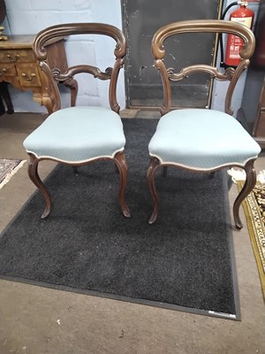 Lot 443 - A pair of Victorian balloon back dining chairs