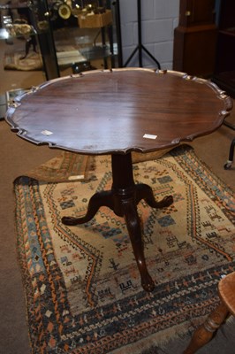 Lot 686 - A Georgian mahogany supper table, the dished...