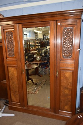 Lot 690 - A late Victorian American walnut wardrobe with...