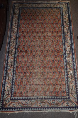 Lot 702 - Small Middle Eastern wool floor rug