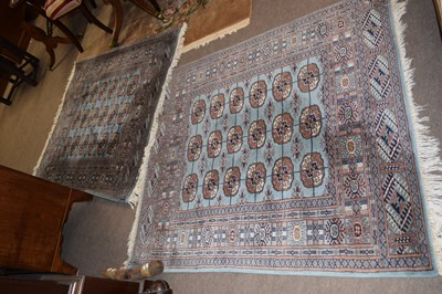 Lot 470 - A pair of modern Pakistani blue ground rugs,...