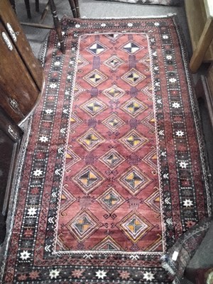 Lot 455 - A 20th Century Middle Eastern wool floor rug...