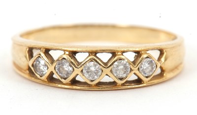 Lot 105 - A 14ct gemset ring, set with five white CZ's,...