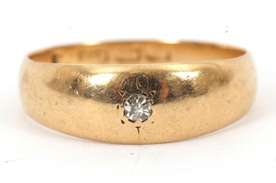 Lot 138 - An 18ct diamond ring, with a single gypsy set...